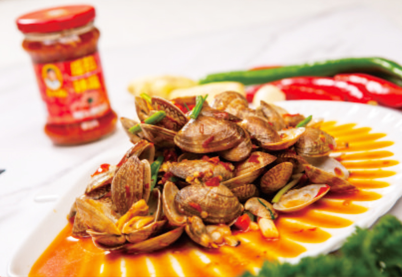 Fried clams with tomatoes